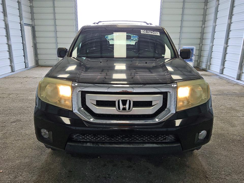 2009 Honda Pilot VIN 5FNYF38909B021757 COPART salvage auction — MINOR DENT/SCRATCHES, Fl - Certificate Of Title, sold $1,050 on 2026-07-09 (photo 5)