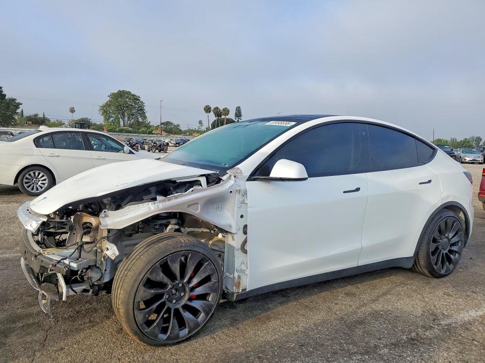 2022 Tesla Model y VIN 7SAYGDEF8NF488743 COPART salvage auction — FRONT END, Ca - Salvage Certificate, sold $9,900 on 2026-07-24 (photo 1)