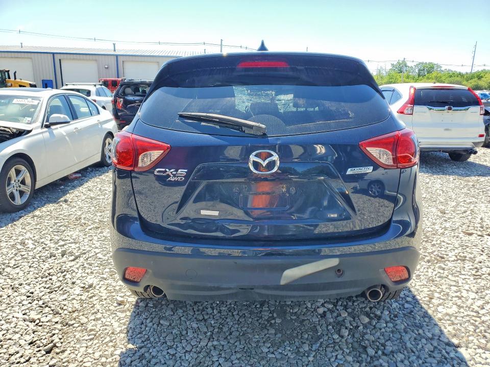 2016 Mazda VIN JM3KE4DY1G0767228 COPART salvage auction — ROLLOVER, Ma - Cert Of Title-Reconstrctd Coll, sold $2,350 on 2026-07-16 (photo 6)