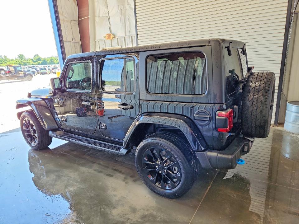 2023 Jeep Wrangler / VIN 1C4JJXP64PW556775 COPART salvage auction — MINOR DENT/SCRATCHES, Mo - Certificate Of Title, sold $22,250 on 2026-07-02 (photo 2)