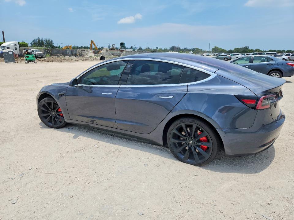 2018 Tesla Model 3 VIN 5YJ3E1EA1JF009525 COPART salvage auction — MINOR DENT/SCRATCHES, Fl - Certificate Of Title, sold $6,200 on 2026-07-07 (photo 2)