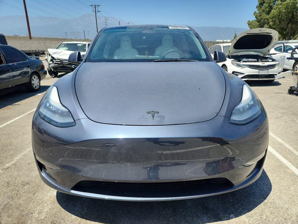 2021 Tesla Model y VIN 5YJYGDEEXMF157438 COPART salvage auction — REAR END, CA - SALVAGE CERTIFICATE, sold $500 on 2026-07-28 (photo 5)