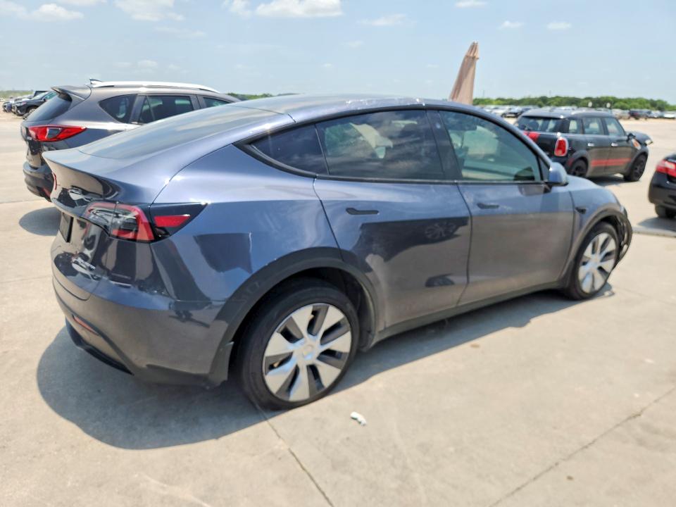 2023 Tesla Model y VIN 7SAYGDEE3PA075300 COPART salvage auction — SIDE, Tx - Salvage Vehicle Title, sold $8,100 on 2026-07-27 (photo 3)