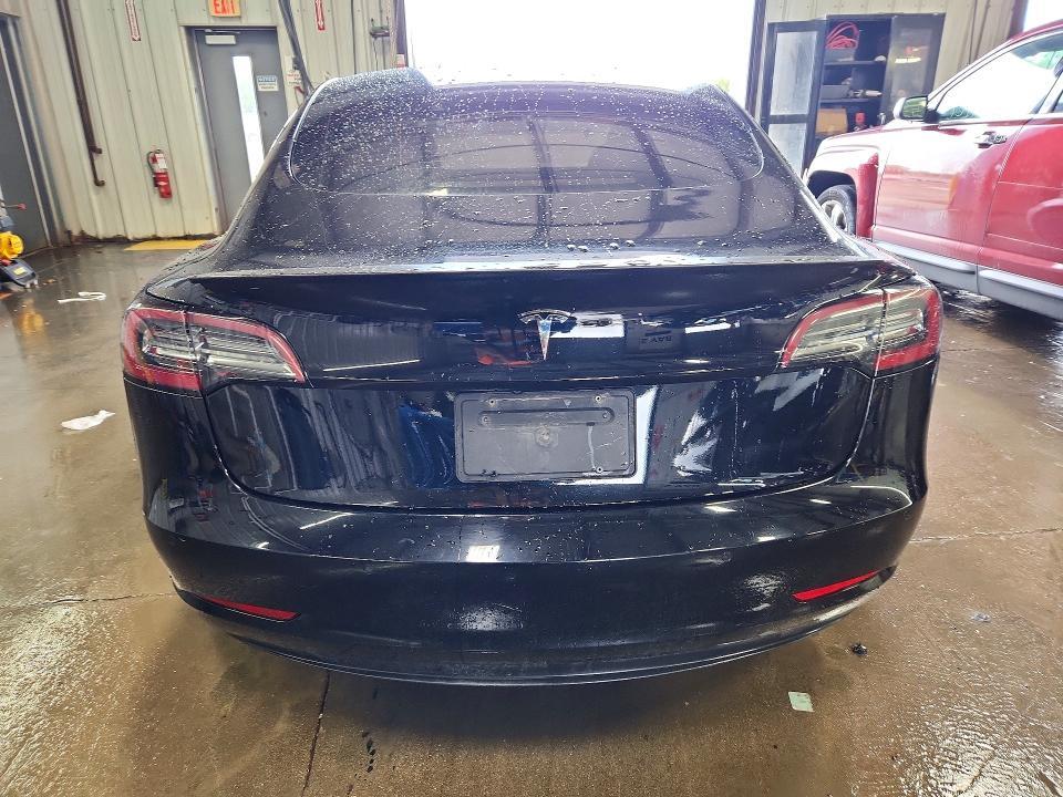 2021 Tesla Model 3 VIN 5YJ3E1EB6MF869496 COPART salvage auction — SIDE, IL - SALVAGE CERTIFICATE, sold $10,800 on 2026-07-30 (photo 6)