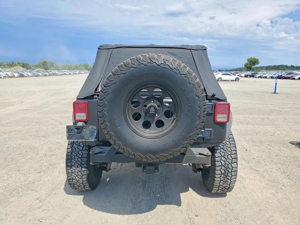 2009 Jeep Wrangler unlimited VIN 1J4GA39129L752913 COPART salvage auction — SIDE, CA - SALVAGE CERTIFICATE, sold $6,600 on 2026-07-02 (photo 6)