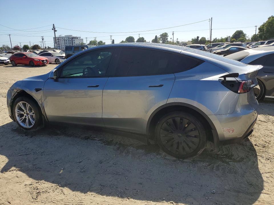 2024 Tesla Model y VIN 7SAYGDEE0RA288000 COPART salvage auction — REAR END, Ca - Salvage Certificate, sold $7,000 on 2026-07-13 (photo 2)