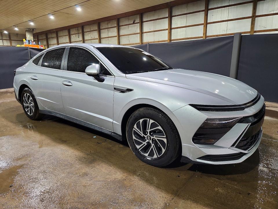 2026 Hyundai Sonata hybrid VIN KMHL24JJXTA164386 COPART salvage auction — SIDE, Fl - Certificate Of Title, sold $10,900 on 2026-07-20 (photo 4)