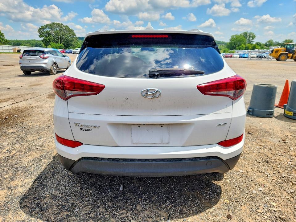 2018 Hyundai Tucson VIN KM8J3CA41JU769692 COPART salvage auction — MINOR DENT/SCRATCHES, Wi - Certificate Of Title, sold $3,650 on 2026-07-21 (photo 6)