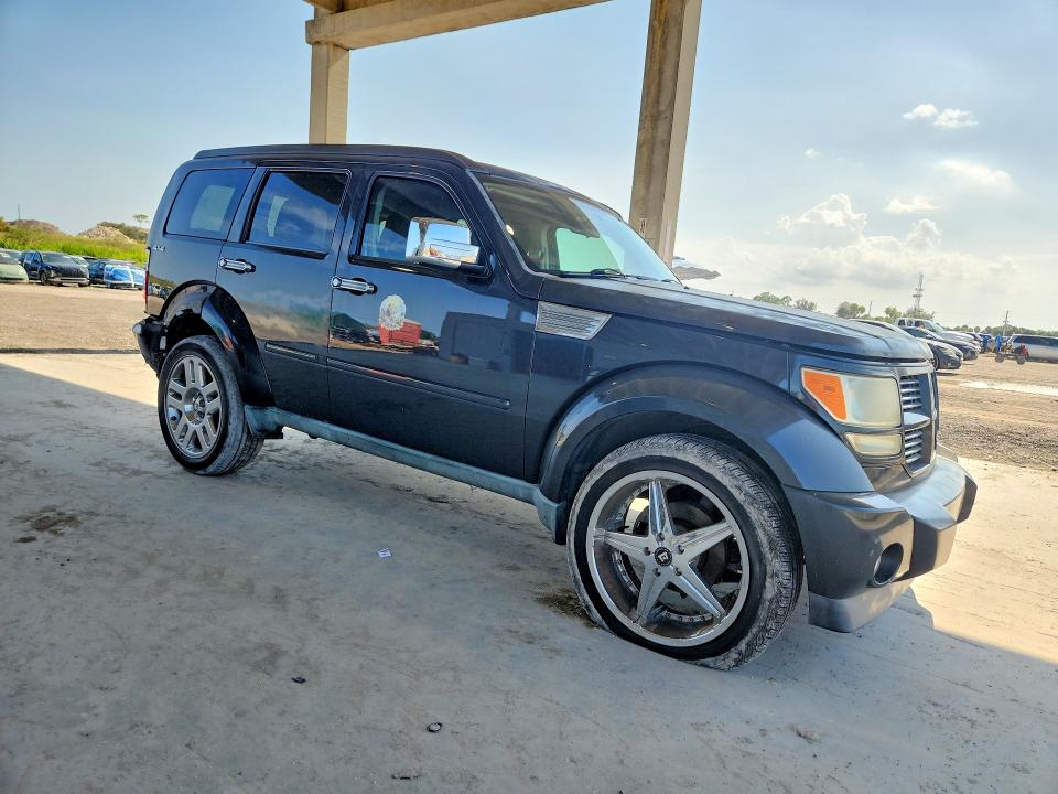 2011 Dodge VIN 1D4PU4GK4BW590627 COPART salvage auction — REAR END, FL - CERT OF TITLE SLVG REBUILDABLE, sold $350 on 2026-07-02 (photo 4)