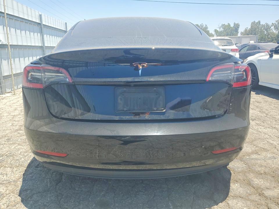 2023 Tesla Model 3 VIN 5YJ3E1EA4PF655229 COPART salvage auction — Burn Interior, Ca - Salvage Certificate, sold $7,000 on 2026-07-20 (photo 6)