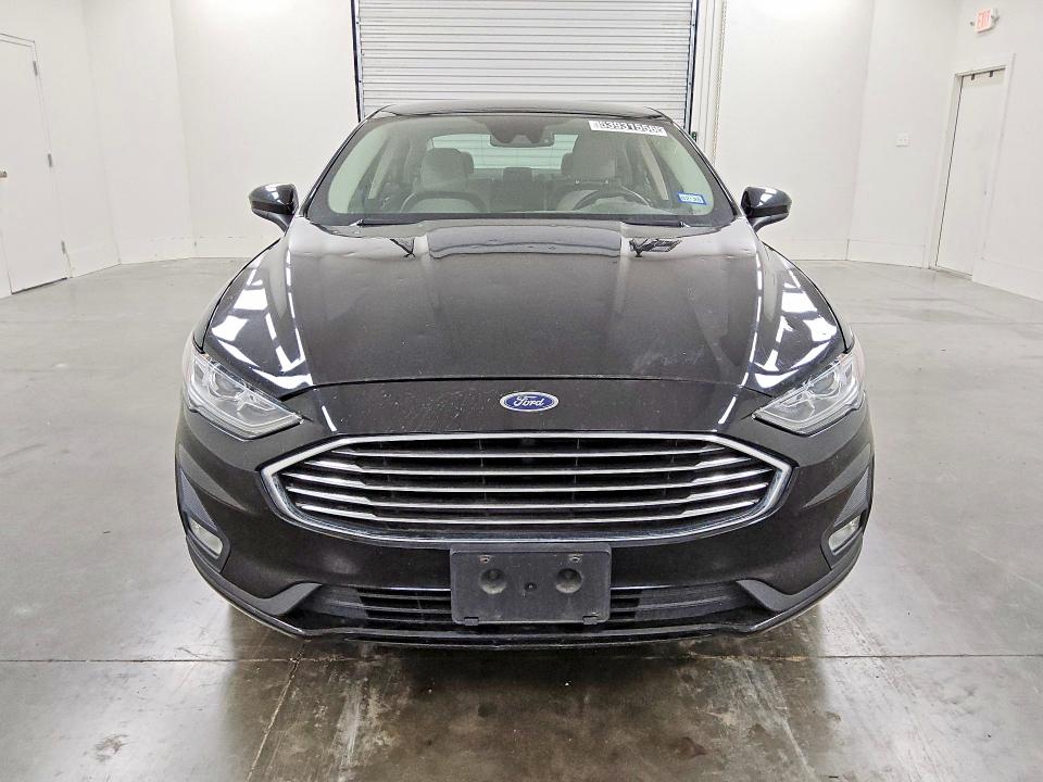 2019 Ford Fusion VIN 3FA6P0HD6KR147915 COPART salvage auction — MINOR DENT/SCRATCHES, Tx - Certificate Of Title, sold $2,850 on 2026-07-02 (photo 5)