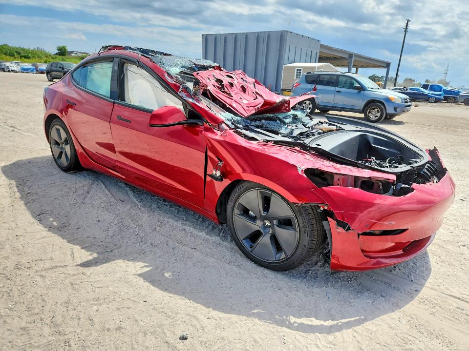 2023 Tesla Model 3 VIN 5YJ3E1EA9PF433754 COPART salvage auction — ROLLOVER, Fl - Certificate Of Destruction, sold $1,400 on 2026-07-13 (photo 4)