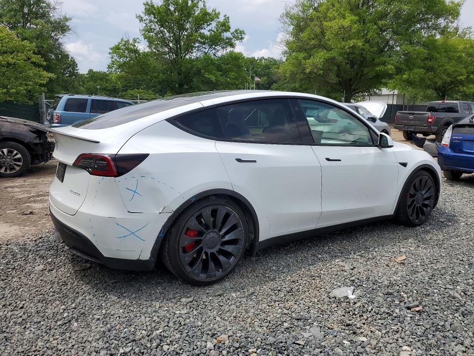 2023 Tesla Model y VIN 7SAYGDEF7PF788423 COPART salvage auction — REAR END, Salvage Title, sold $13,500 on 2026-07-23 (photo 3)