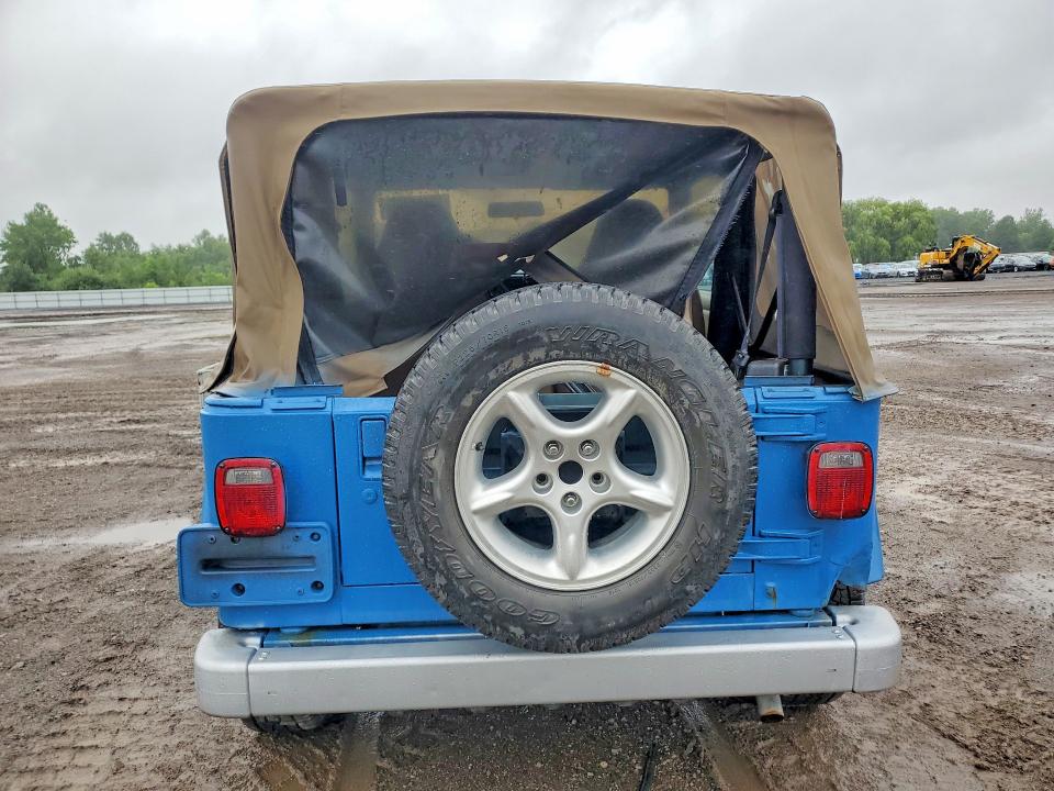 2002 Jeep Wrangler / VIN 1J4FA29P02P769458 COPART salvage auction — VANDALISM, OH - CERT OF TITLE-SALVAGE, sold $500 on 2026-07-02 (photo 6)