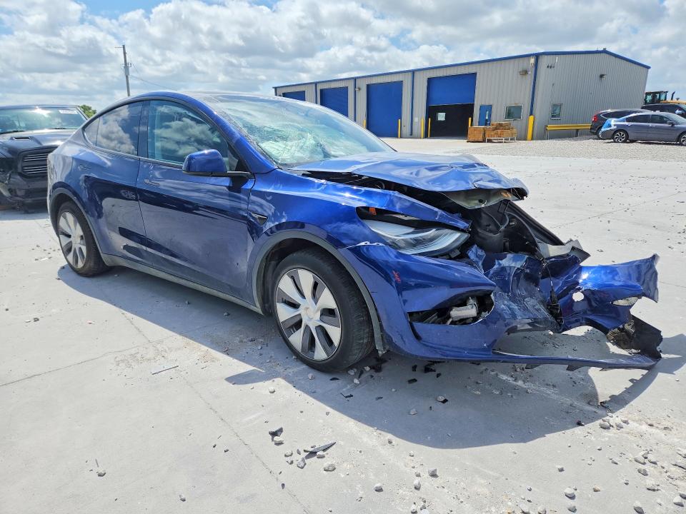 2023 Tesla Model y VIN 7SAYGDEE7PA063943 COPART salvage auction — FRONT END, Tx - Salvage Vehicle Title, sold $6,100 on 2026-07-24 (photo 4)