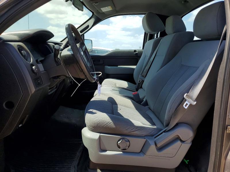 2012 Ford VIN 1FTNF1CT2CKE24286 COPART salvage auction — MINOR DENT/SCRATCHES, Tx - Certificate Of Title, sold $1,400 on 2026-07-02 (photo 7)