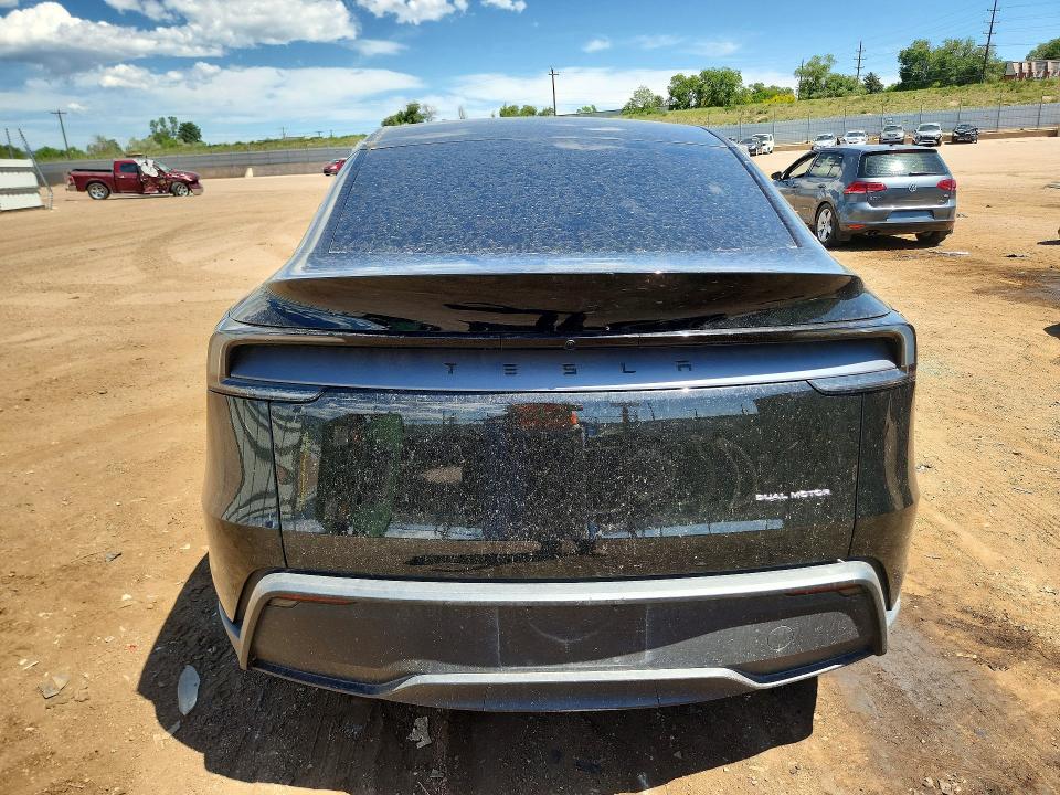 2026 Tesla Model y VIN 7SAYGDEE1TF413984 COPART salvage auction — ALL OVER, CO - SALVAGE TITLE, sold $14,800 on 2026-07-29 (photo 6)