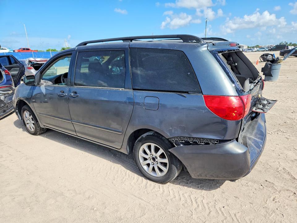 2010 Toyota Sienna VIN 5TDKK4CC6AS296284 COPART salvage auction — REAR END, Fl - Cert Of Title Slvg Rebuildable, sold $700 on 2026-07-15 (photo 2)