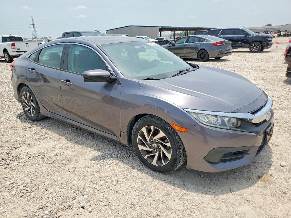 2018 Honda VIN 19XFC2F74JE040947 COPART salvage auction — SIDE, Tx - Salvage Vehicle Title, sold $5,600 on 2026-07-31 (photo 4)