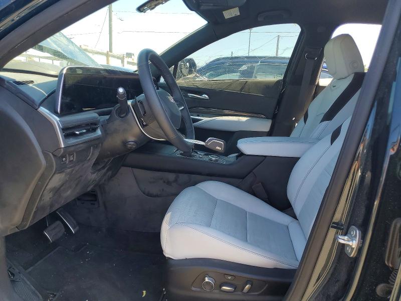 2025 Cadillac Xt4 VIN 1GYFZER46SF159327 COPART salvage auction — SIDE, Az - Dis/Dlr/Exp Only Salvage Title, sold $10,500 on 2026-07-29 (photo 7)