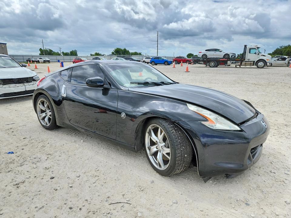 2009 Nissan 370z VIN JN1AZ44E79M405997 COPART salvage auction — SIDE, Tx - Salvage Vehicle Title, sold $2,200 on 2026-07-16 (photo 4)