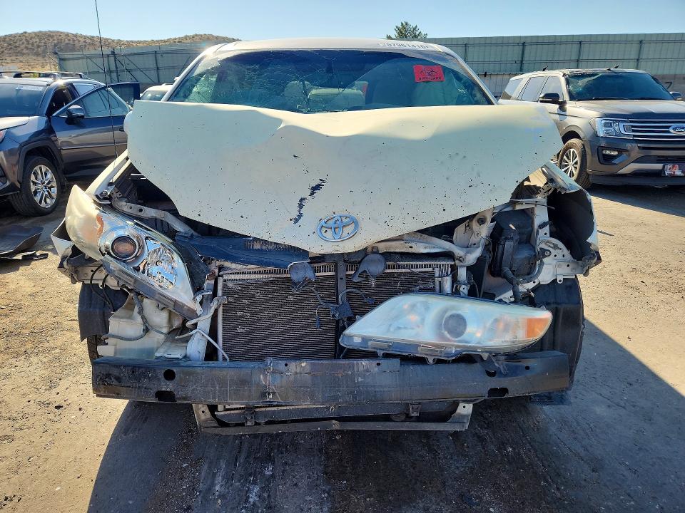 2014 Toyota Sienna VIN 5TDKK3DC2ES481253 COPART salvage auction — ALL OVER, NM - CERT OF TITLE-SALVAGE (P), sold $1,100 on 2026-07-13 (photo 5)