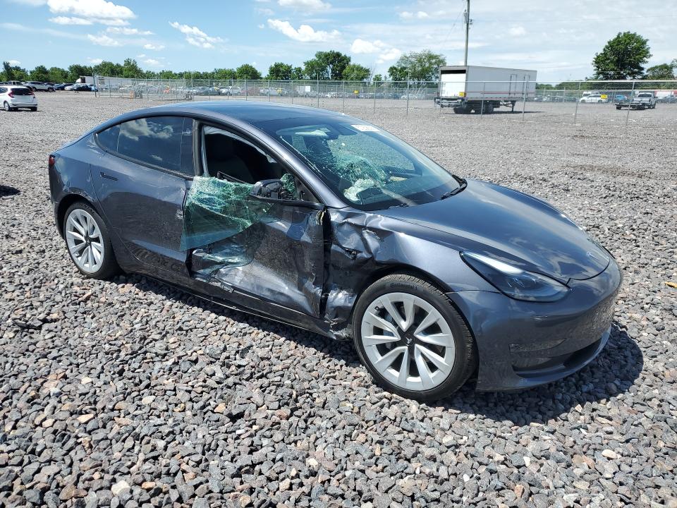 2021 Tesla Model 3 VIN 5YJ3E1EB0MF983543 COPART salvage auction — SIDE, In - Cert Of Title-Salvage Title, sold $4,600 on 2026-07-28 (photo 4)