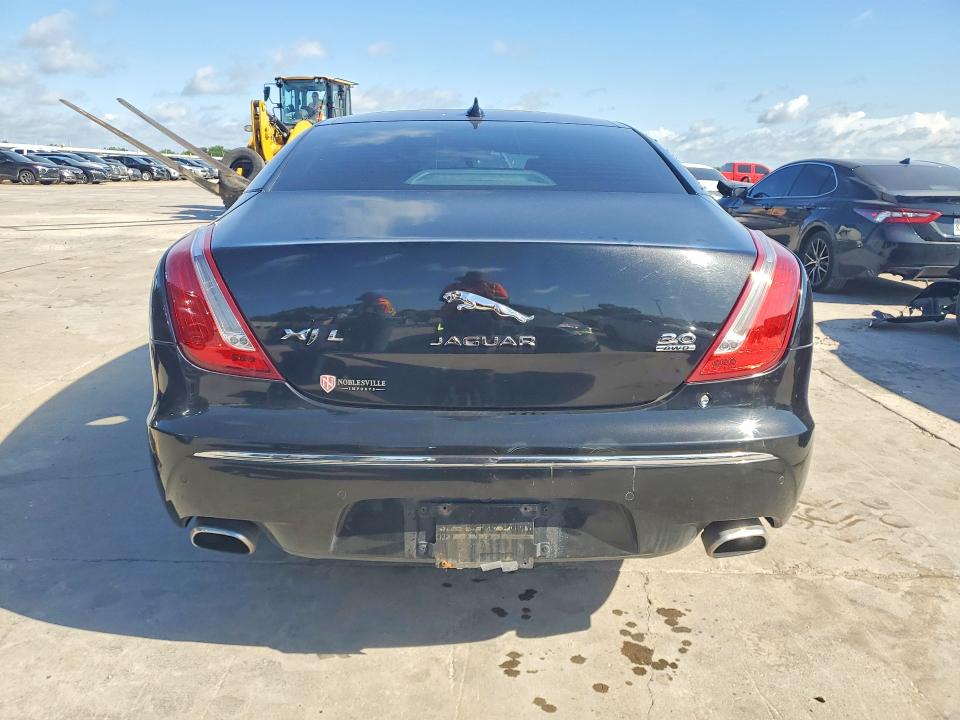 2015 Jaguar Xj series VIN SAJWJ2GD4F8V81199 COPART salvage auction — ENGINE BURN, Tx - Salvage Vehicle Title, sold $550 on 2026-07-02 (photo 6)