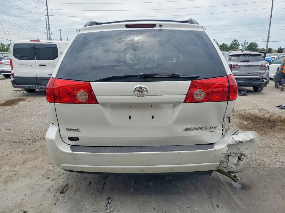 2009 Toyota Sienna VIN 5TDZK22C49S238609 COPART salvage auction — REAR END, FL - CERT OF TITLE SLVG REBUILDABLE, sold $325 on 2026-07-21 (photo 6)