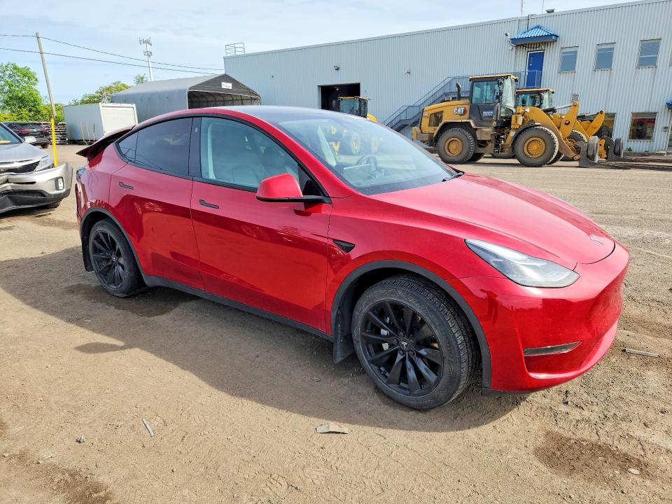 2023 Tesla Model y VIN LRWYGDFDXPC966569 COPART salvage auction — REAR END, Qc - Gravement Accidente, sold $7,600 on 2026-07-07 (photo 4)