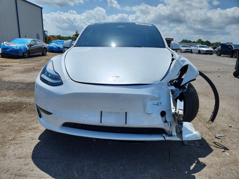 2023 Tesla Model y VIN 7SAYGDEE2PA079340 COPART salvage auction — FRONT END, Fl - Cert Of Title Slvg Rebuildable, sold $14,100 on 2026-07-13 (photo 5)
