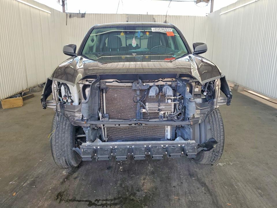 2020 Toyota Tacoma VIN 3TMAZ5CN8LM126963 COPART salvage auction — FRONT END, Fl - Certificate Of Title, sold $16,700 on 2026-07-09 (photo 5)