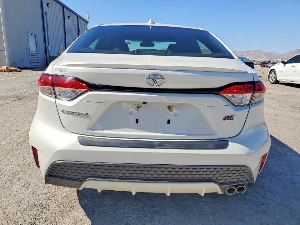 2021 Toyota Corolla VIN JTDS4MCE2MJ075701 COPART salvage auction — SIDE, Nv - Salvage Title, sold $6,300 on 2026-07-23 (photo 6)