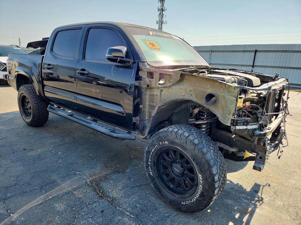 2017 Toyota Tacoma VIN 3TMCZ5AN8HM078304 COPART salvage auction — INTERIOR BURN, Ca - Salvage Certificate, sold $5,900 on 2026-07-09 (photo 4)