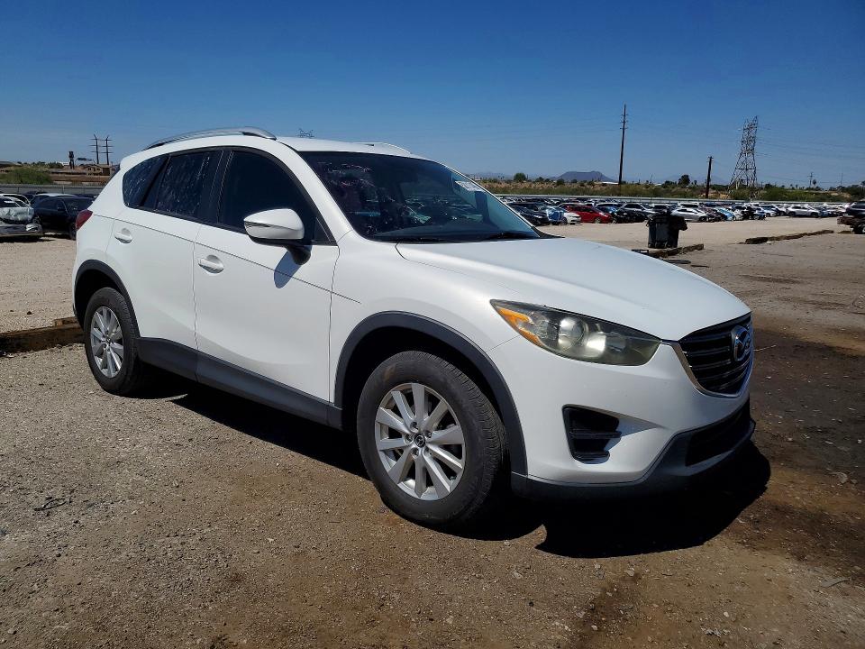2016 Mazda VIN JM3KE2BY3G0684973 COPART salvage auction — SIDE, Az - Cert Of Title - Salvage, sold $2,350 on 2026-07-17 (photo 4)