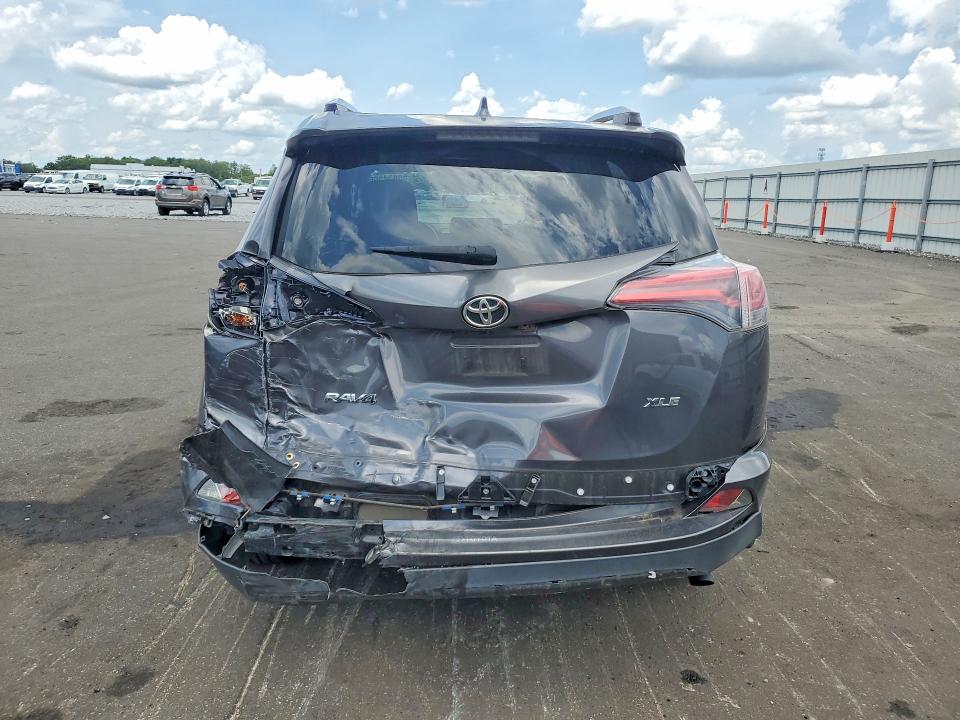 2016 Toyota Rav 4 VIN JTMWFREV9GJ091405 COPART salvage auction — REAR END, Fl - Cert Of Title Slvg Rebuildable, sold $1,950 on 2026-07-13 (photo 6)