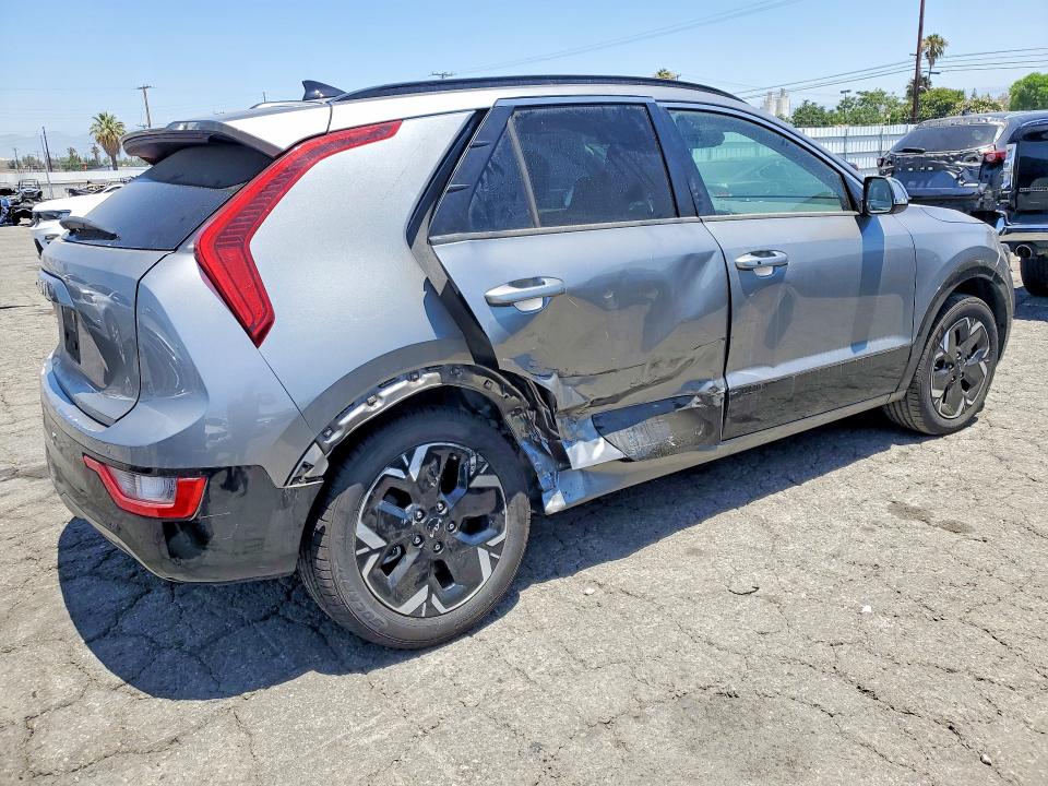 2023 Kia Niro VIN KNDCR3L11P5028654 COPART salvage auction — SIDE, CA - SALVAGE CERTIFICATE, sold $8,200 on 2026-07-16 (photo 3)