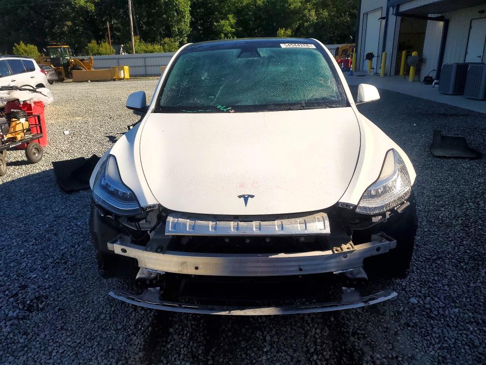 2022 Tesla Model y VIN 7SAYGDEE1NF439763 COPART salvage auction — REAR END, Nc - Salvage Certificate Of Title, sold $350 on 2026-07-30 (photo 5)