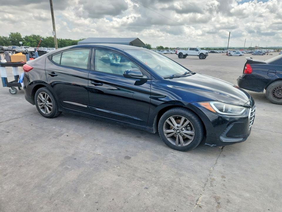 2017 Hyundai Elantra VIN 5NPD84LF4HH029212 COPART salvage auction — HAIL, Tx - Certificate Of Title, sold $3,800 on 2026-07-09 (photo 4)