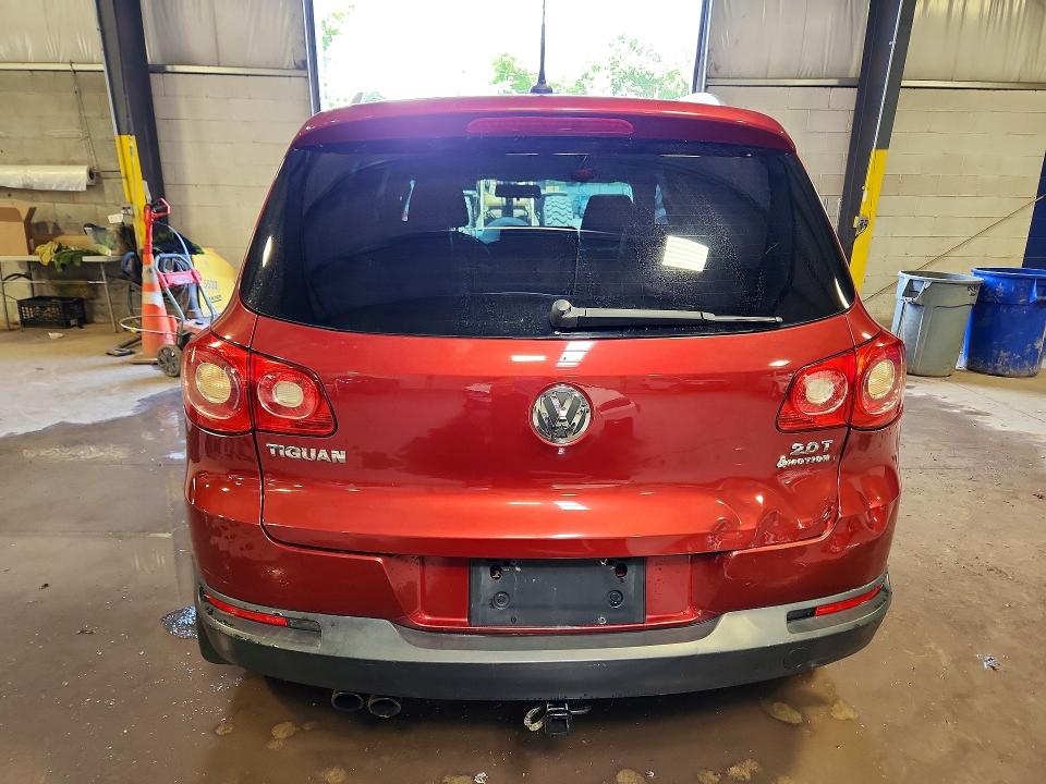 2011 Volkswagen Tiguan VIN WVGBV7AX7BW001009 COPART salvage auction — VANDALISM, Pa - Cert Of Salvage-Theft, sold $15 on 2026-08-03 (photo 6)