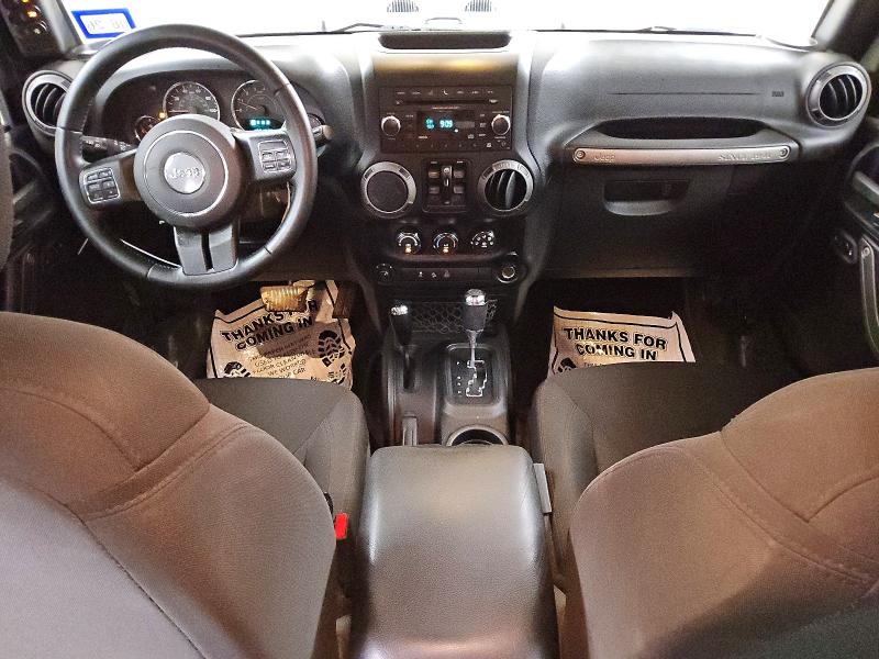 2015 Jeep Wrangler unlimited VIN 1C4BJWDG1FL760932 COPART salvage auction — MINOR DENT/SCRATCHES, Tx - Certificate Of Title, sold $3,750 on 2026-07-09 (photo 8)
