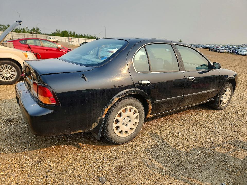 1998 Nissan Maxima VIN JN1CA21D0WT604844 COPART salvage auction — REAR END, AB - BOS - SALVAGE, sold $200 on 2026-07-16 (photo 3)