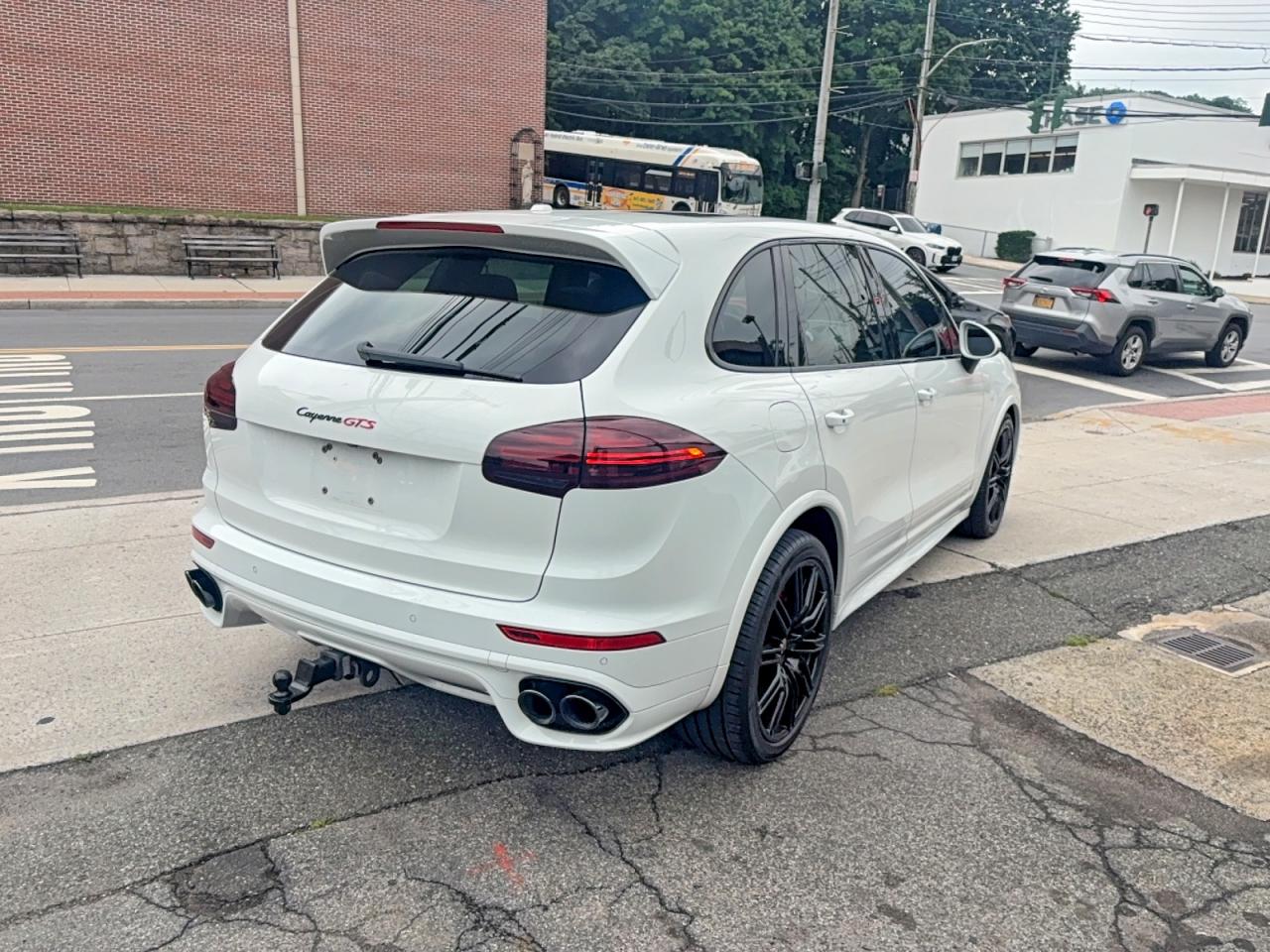 2016 Porsche Cayenne VIN WP1AD2A21GLA79142 COPART salvage auction — Normal Wear, NY - CERT OF TITLE-REBUILT SALVAGE (P), sold $1,500 on 2026-06-30 (photo 4)