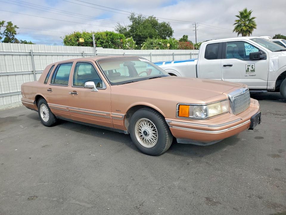 1994 Lincoln TOWN CAR VIN 1LNLM81W5RY693239 COPART salvage auction — MINOR DENT/SCRATCHES, Ca - Dis/Dlr/Exp Only Clean Title, sold $60 on 2026-07-30 (photo 4)