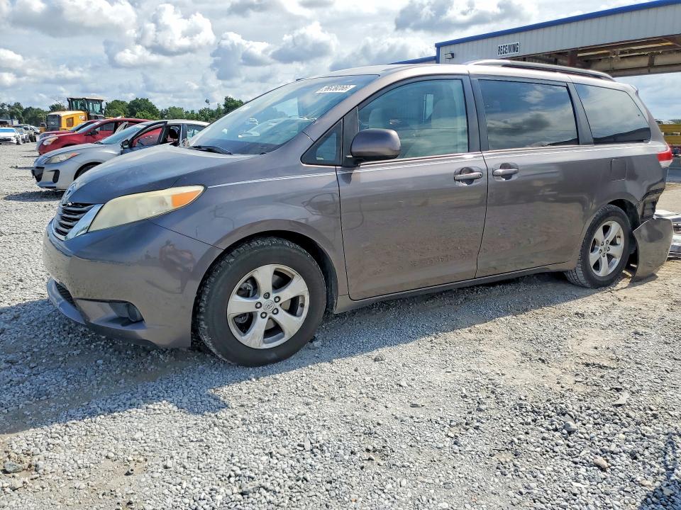 2014 Toyota Sienna VIN 5TDKK3DC7ES485511 COPART salvage auction — SIDE, FL - CERT OF TITLE SLVG REBUILDABLE, sold $1,450 on 2026-07-10 (photo 1)