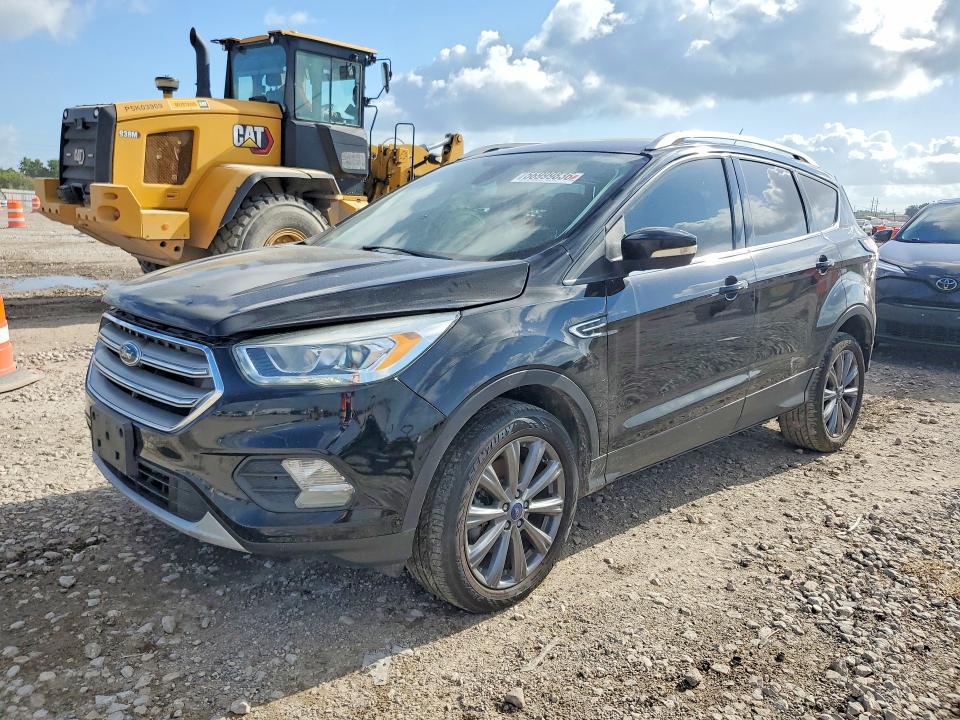 2017 Ford Escape VIN 1FMCU0J98HUD84298 COPART salvage auction — SIDE, Tx - Salvage Vehicle Title, sold $2,300 on 2026-07-09 (photo 1)