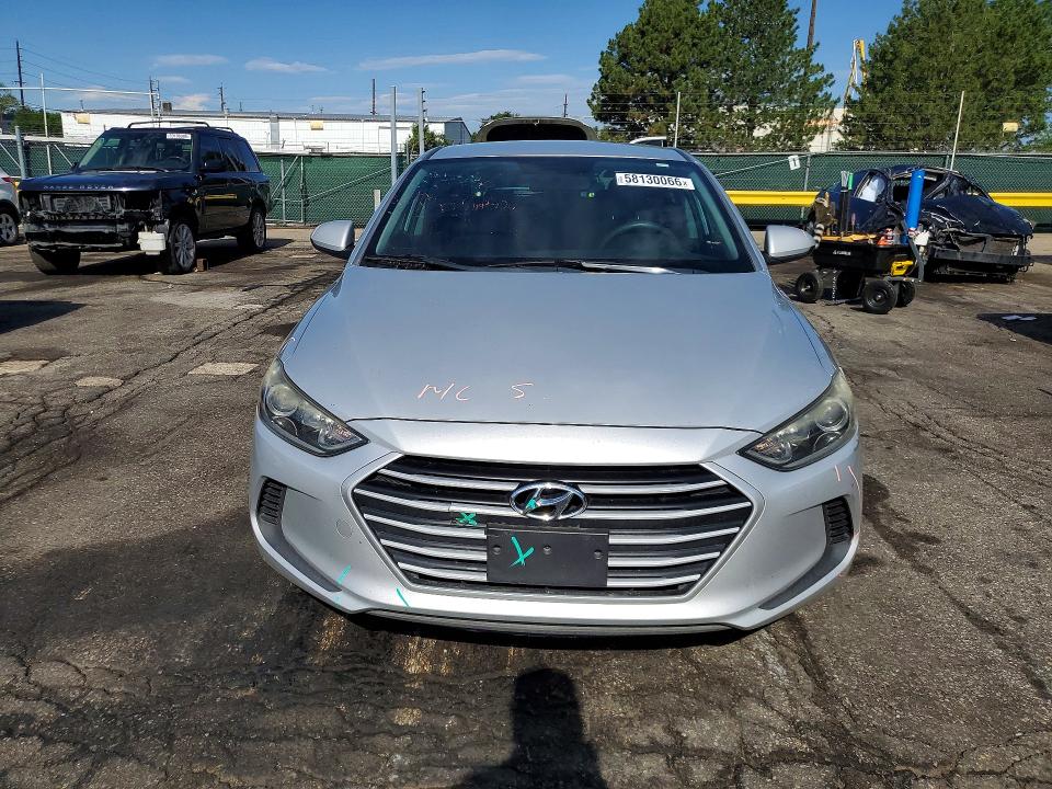 2018 Hyundai VIN KMHD74LF4JU584249 COPART salvage auction — REAR END, Co - Public - Salvage Title, sold $2,050 on 2026-07-07 (photo 5)