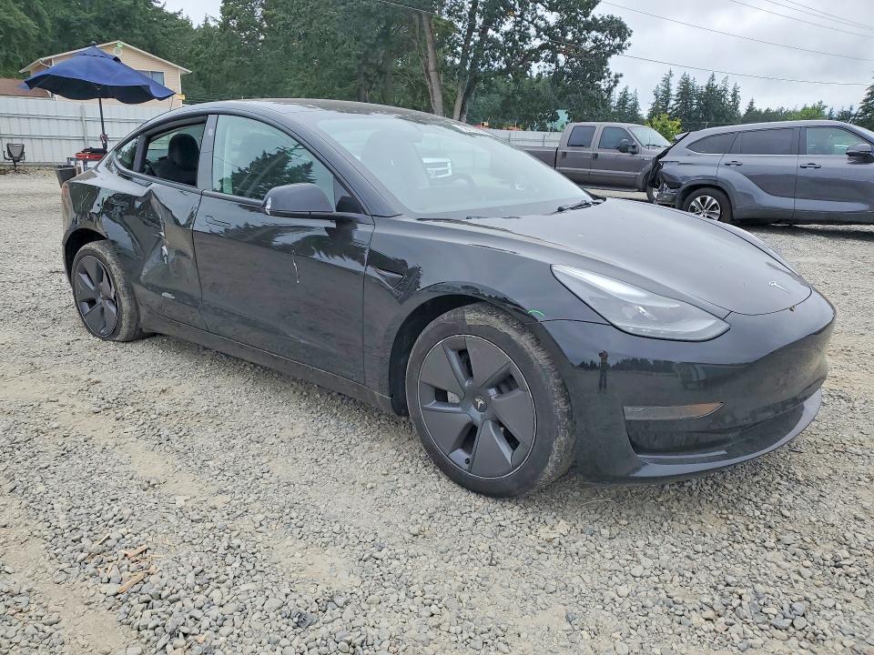 2023 Tesla VIN 5YJ3E1EA5PF695433 COPART salvage auction — SIDE, WA - BILL OF SALE, sold $3,500 on 2026-07-21 (photo 4)