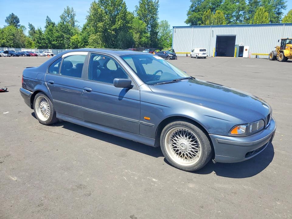 2000 BMW 5er VIN WBADM5345YBY18399 COPART salvage auction — REAR END, Or - Salvage Title Certificate, sold $500 on 2026-08-12 (photo 4)