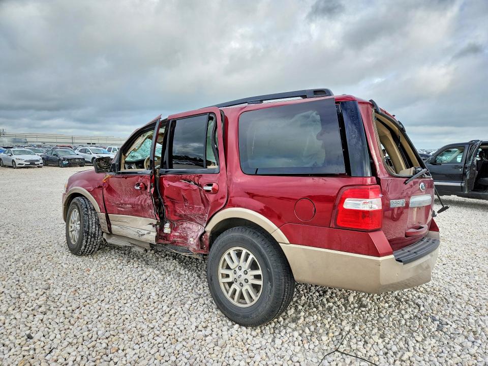 2014 Ford VIN 1FMJU1J56EEF18418 COPART salvage auction — ROLLOVER, Tx - Salvage Vehicle Title, sold $600 on 2026-07-02 (photo 2)